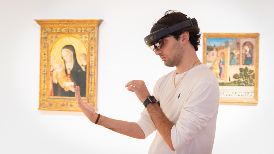 Giacomo Zanetti, an exchange student, tries out the Collection Connection's new AR device at the Lowe Art Museum. Photo: Joshua Prezant/University of Miami